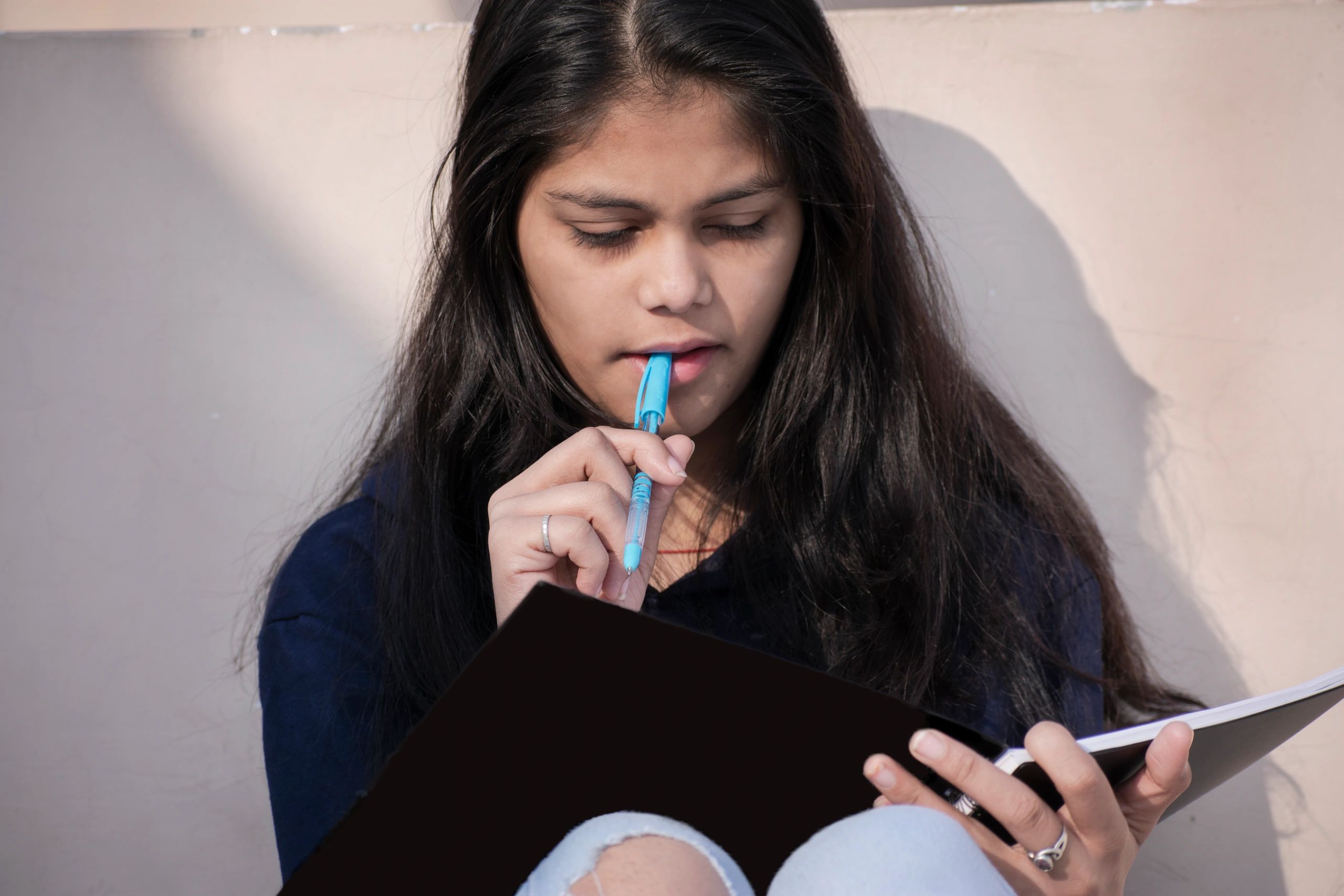 Student portrait with sketchbook