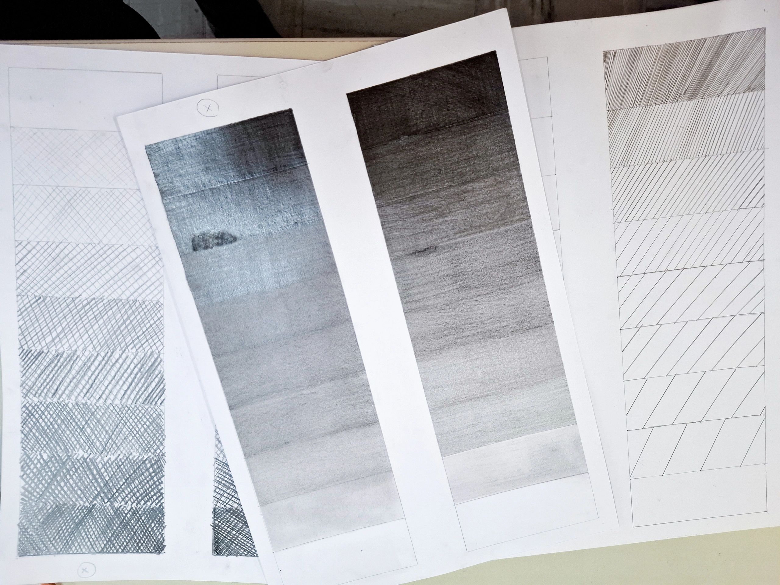Graphite texture studies on a work table